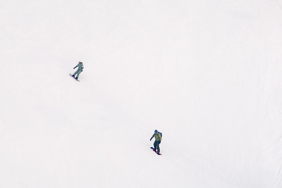 Snowboarders in Action