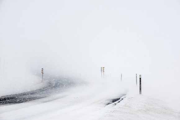 Highway with Sharp Curve During Blizzard
