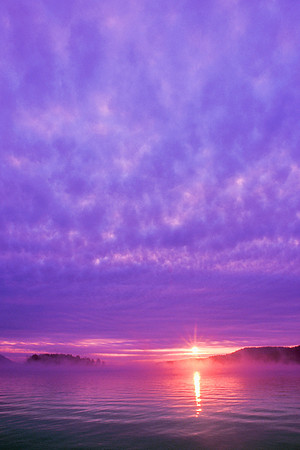 Sunrise and Fog Over Lake