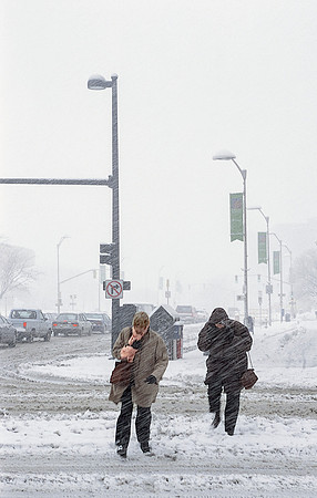 City Pedestrians in Snow Storm
