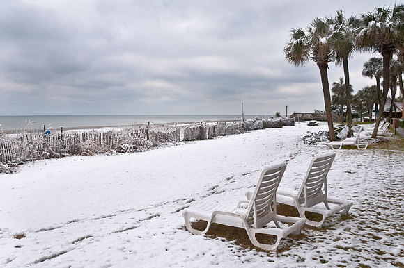 Beach Lounge Chairs Covered With Snow
