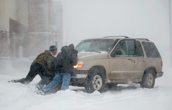 Good Samaritans Push Motorist Stuck in Snow (Day)