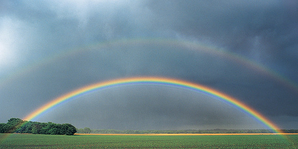 Double Rainbow Over Rural Landscape