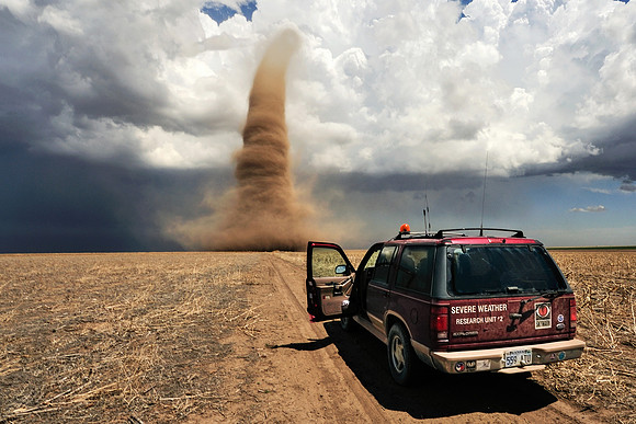 Storm Chasers Monitor a Tornado From Close-Up