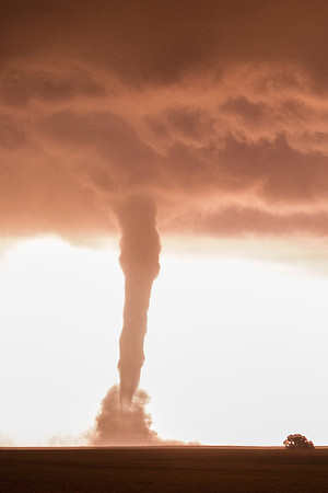 Tornado Illuminated by Lightning