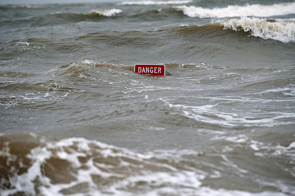 Danger Sign Surrounded By Water